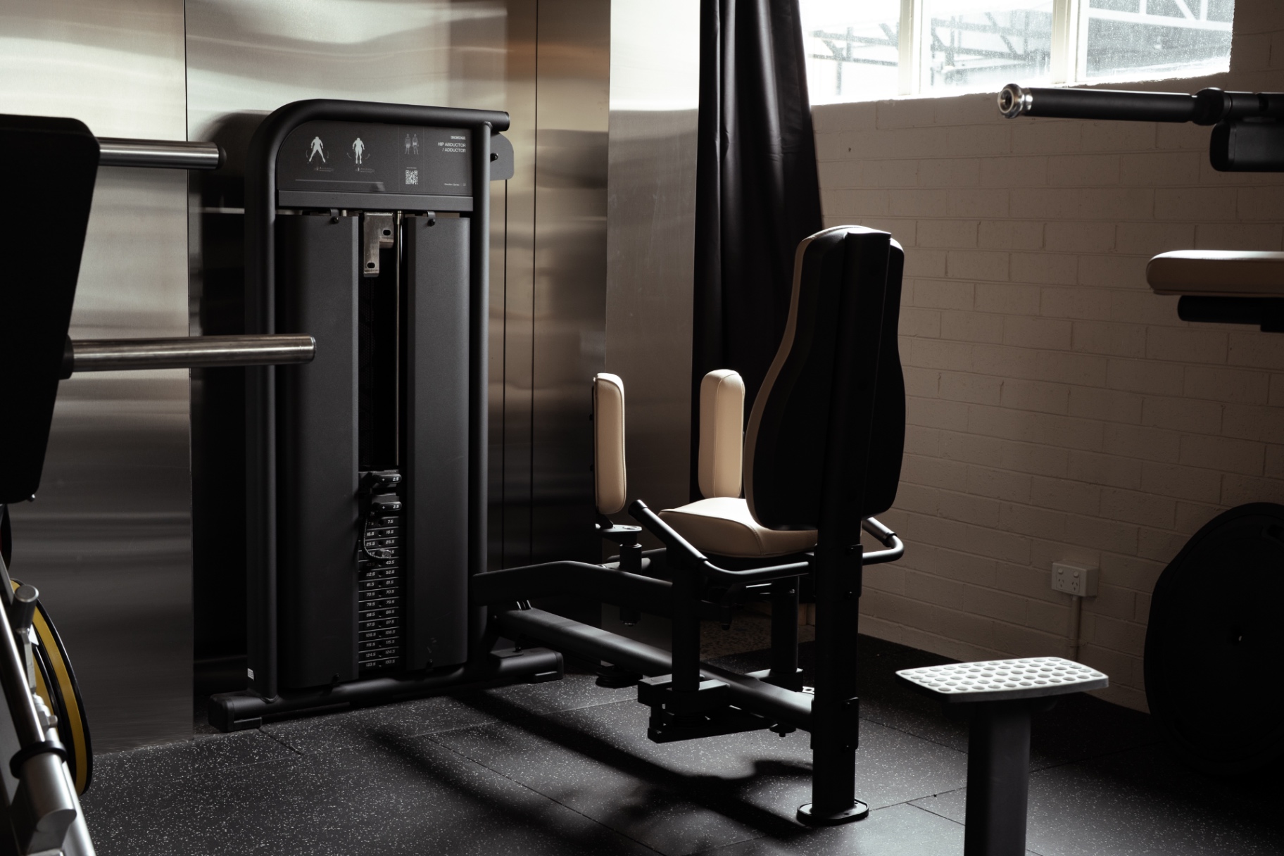 Seated strength machine at HER Fitness Club